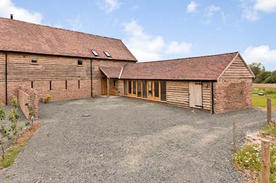 A beautiful 16 century barn converted into a home set at the edge of a little village called Leysters, Herefordshire